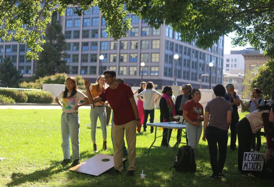 iBio conference attendees enjoy a social event on the Barker lawn